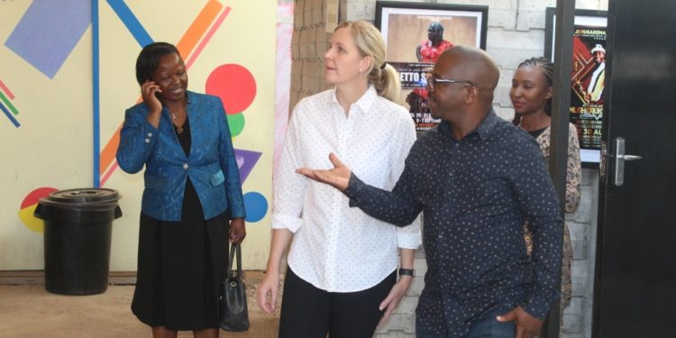 Minister of Arts Kirsty Coventry taking a tour of the Little Theatre.