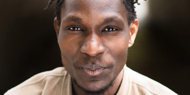 JohnRwothomack Headshot